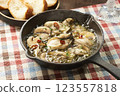 Hot Ajillo with oysters 123557818