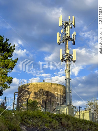 A large Telco Tower on a hill providing wireless communications 123558834