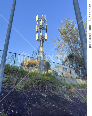 A large Telco Tower on a hill providing wireless communications 123558836