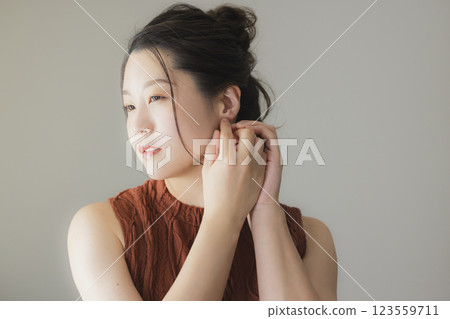 Woman in brown dress 123559711