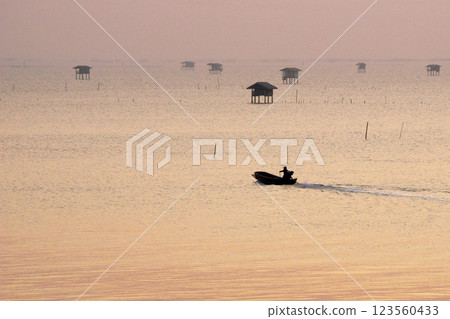 Small boats in the sea Small boats in the sea 123560433