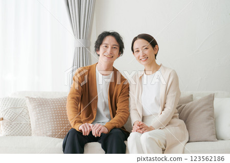 A relaxing couple in the living room 123562186