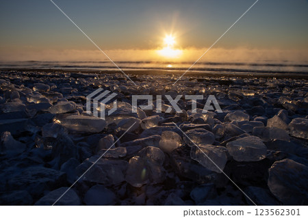 Jewelry ice washing onto the shore Jewelry ice washing onto the shore 123562301