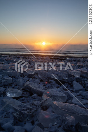 Jewelry ice washing onto the shore Jewelry ice washing onto the shore 123562308