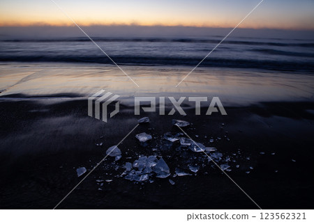 Jewelry ice washing onto the shore Jewelry ice washing onto the shore 123562321