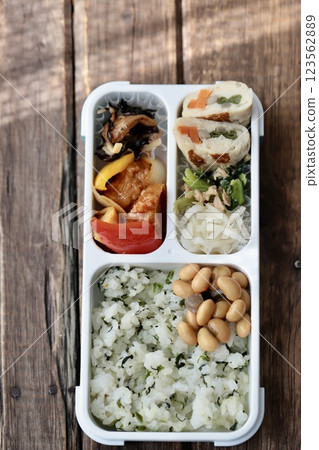 Homemade Japanese bento box using a bento box with integrated dividers Homemade Japanese bento box using a bento box with integrated dividers 123562889