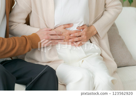 A sick wife and a worried husband (no face) 123562920