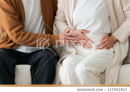 A sick wife and a worried husband (no face) 123562923