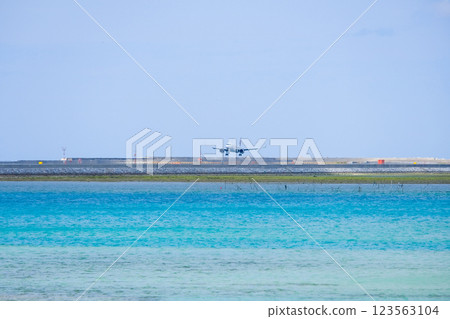 Plane seen from Senaga Island, Okinawa Plane seen from Senaga Island, Okinawa 123563104