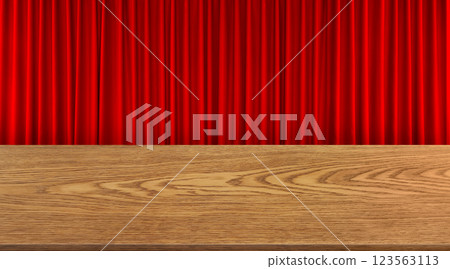 An empty wooden table is set against a red curtain background. An empty wooden table is set against a red curtain background. 123563113