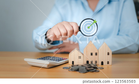 Target to saving money for retirement, Property cash flow, House with money, Symbolizing tax planning, Concept of finance or refinance real estate, Growth investment from property, Loan, Real. 123563503