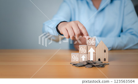 House with money, Symbolizing tax planning, Concept of finance or refinance real estate, Property cash flow, Property cash flow, Saving money for retirement, Investment, Loan, Real, Mortgage. 123563504