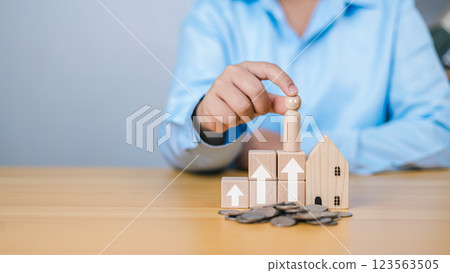 Saving money for retirement, Property cash flow, House with money, Symbolizing tax planning, Concept of finance or refinance real estate, Growth investment from property, Loan, Real, Mortgage. Saving money for retirement, Property cash flow, House with money, Symbolizing tax planning, Concept of finance or refinance real estate, Growth investment from property, Loan, Real, Mortgage. 123563505