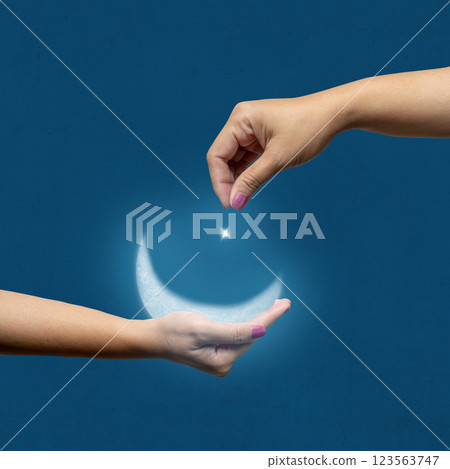 A human hand showing a crescent moon and star in the night scene background. Concept of Religion, Spiritual or Ramadan 123563747