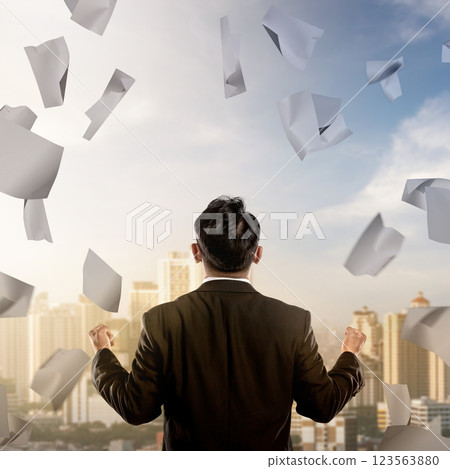 Businessmen feel stressed with flying paperwork at the workplace. Concept of business problem and overworked 123563880