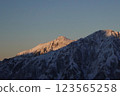 Mt. Yari in early winter: Sunrise over Mt. Kasagatake from Hidazawa / Northern Alps "Snowy Mountain Climbing" 123565258
