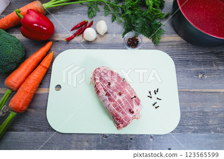 Pork shoulder loin wrapped in net Pork shoulder loin wrapped in net 123565599