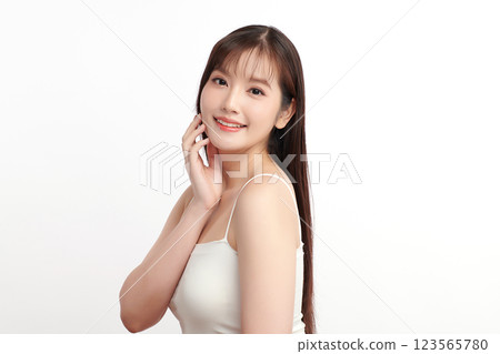Beautiful young asian woman with clean fresh skin on white background, Face care, Facial treatment, Cosmetology, beauty and spa, Asian women portrait. Beautiful young asian woman with clean fresh skin on white background, Face care, Facial treatment, Cosmetology, beauty and spa, Asian women portrait. 123565780