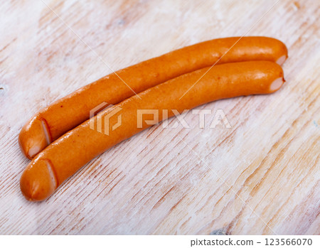 Appetizing czech chicken sausages on wooden table Appetizing czech chicken sausages on wooden table 123566070