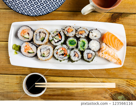 On table there portion set with maki - uramaki and nigiri 123566116