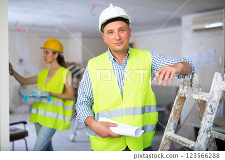 Portrait of positive foreman in apartment, repair works 123566288