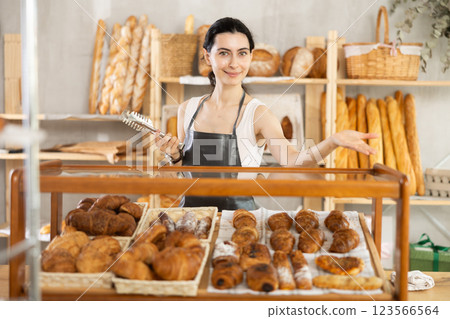 Armenian young woman work selling in family bakery shop 123566564