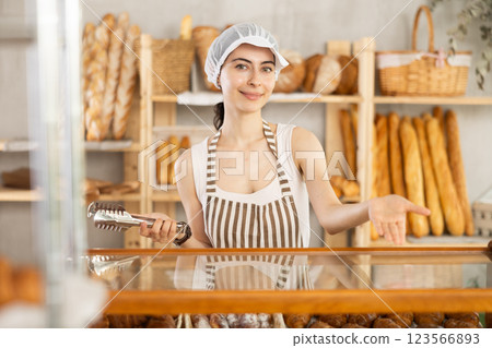 Armenian young woman work selling in family bakery shop 123566893
