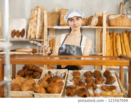 Armenian young woman work selling in family bakery shop Armenian young woman work selling in family bakery shop 123567099