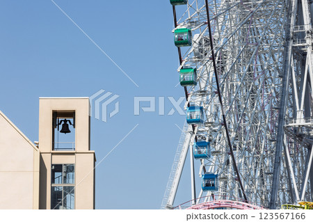 Wedding bells and amusement park ferris wheel 123567166