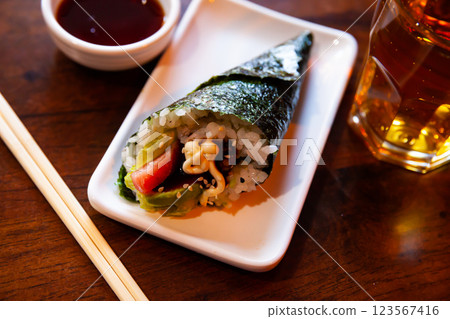 Temaki salmon. Oriental meal 123567416