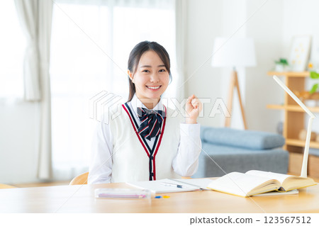School girls studying 123567512