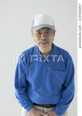 Senior man in work clothes 123568267