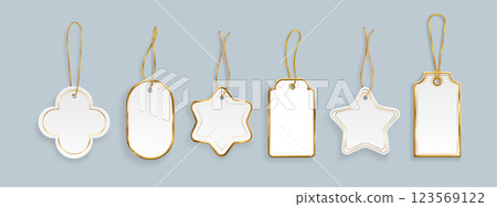 Gold trimmed gift tags with metallic string Gold trimmed gift tags with metallic string 123569122