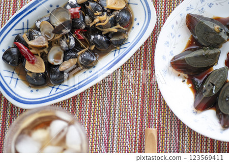 Chinese food appetizer Petan and Shaoxing wine for pickled clams in soy sauce Chinese food appetizer Petan and Shaoxing wine for pickled clams in soy sauce 123569411