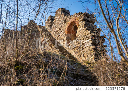 Old fortress ruins near chapel in a small czech town Petrohrad. Way of pilgrims, Czech republic. 123571276
