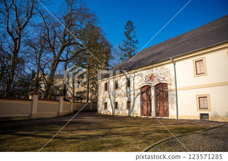 Old brewery with restaurant next to castle in Neo-Gothic style in Chyse, Czech republic. 123571285