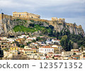 View of the Acropolis and Athens with traditional houses under a cloudy sky 123571352