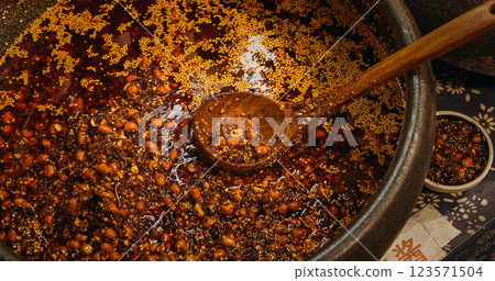 Chengdu, Sichuan, China. Ceramic Pots With Prepared Sichuan Sauce, close up view. Sichuan Cuisine Or Sichuanese Cuisine. Soy Sauce With Bold Flavours, Pungency And Species. Sauce With Garlic And Chili 123571504