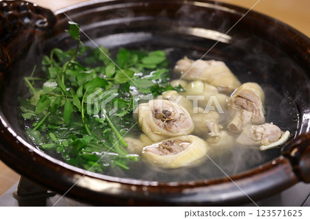 Chicken and watercress hot pot Chicken and watercress hot pot 123571625