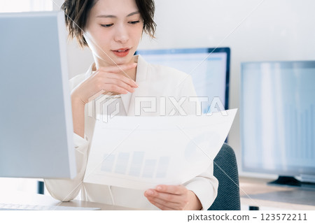 Business woman thinking in the office 123572211