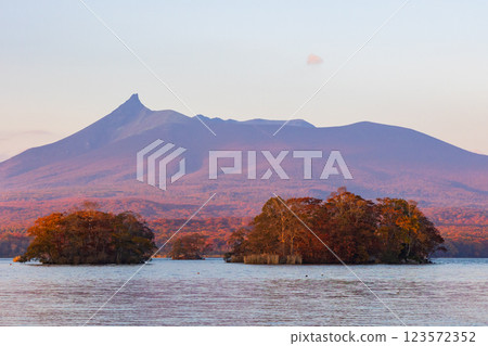 Autumn in Hokkaido: Autumn leaves at Onuma Park, Lake Onuma and Mt. Hokkaido Komagatake at dusk Autumn in Hokkaido: Autumn leaves at Onuma Park, Lake Onuma and Mt. Hokkaido Komagatake at dusk 123572352