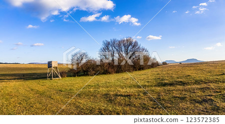 Beautiful autumn day over the meadow,high ground for hunters 123572385
