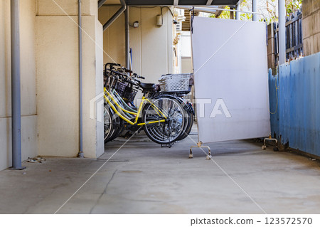 Roofed bicycle parking lot for apartment complexes Roofed bicycle parking lot for apartment complexes 123572570