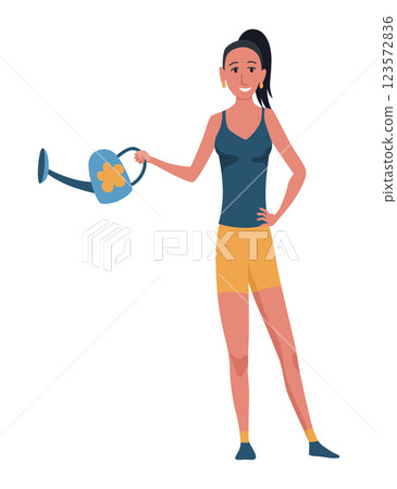 A happy woman enthusiastically watering her vibrant plants while dressed in casual active wear 123572836