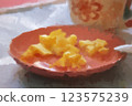 Pineapple on a plate in a restaurant. Digital painting. 123575239