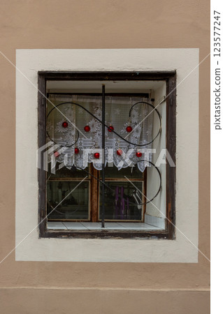 Window with a curtain, Cesky Krumlov, Czechia Window with a curtain, Cesky Krumlov, Czechia 123577247