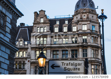 London Trafalgar Square Direction Sign Against a Backdrop of Timeless Architecture 123578499