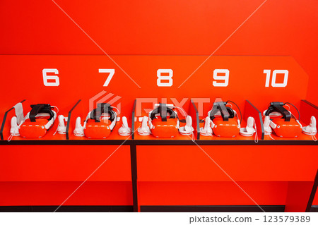 red Virtual reality helmets. A device for immersing the user in the vr. red Virtual reality helmets. A device for immersing the user in the vr. 123579389