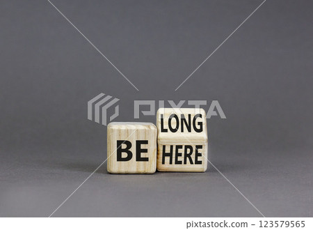 Belonging and belong symbol. Concept words Be here Belong on beautiful wooden block. Beautiful grey table grey background. Business motivational belonging and belong concept. Copy space. Belonging and belong symbol. Concept words Be here Belong on beautiful wooden block. Beautiful grey table grey background. Business motivational belonging and belong concept. Copy space. 123579565