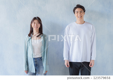 Smiling couple (blue background) 123579658